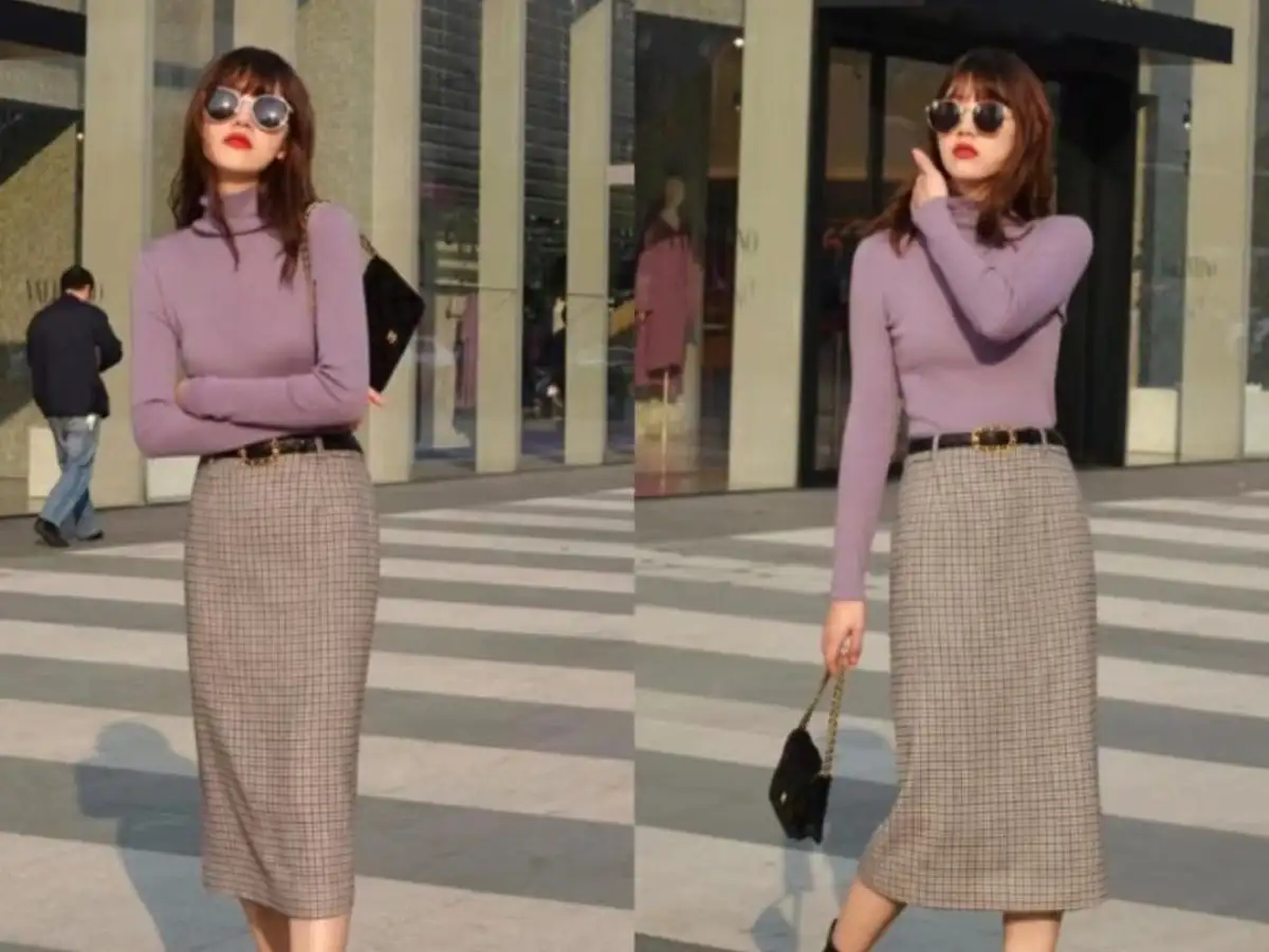 Dùng thắt lưng hoặc chân váy cạp cao là một mẹo giúp bạn tạo đường cong cho cơ thể