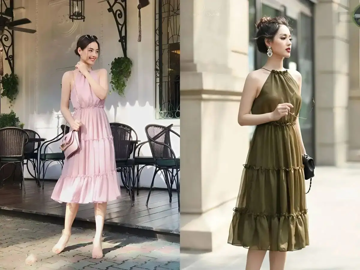 Váy cổ yếm kết hợp với kiểu tóc búi cao gọn gàng tạo điểm nhấn cho tổng thể