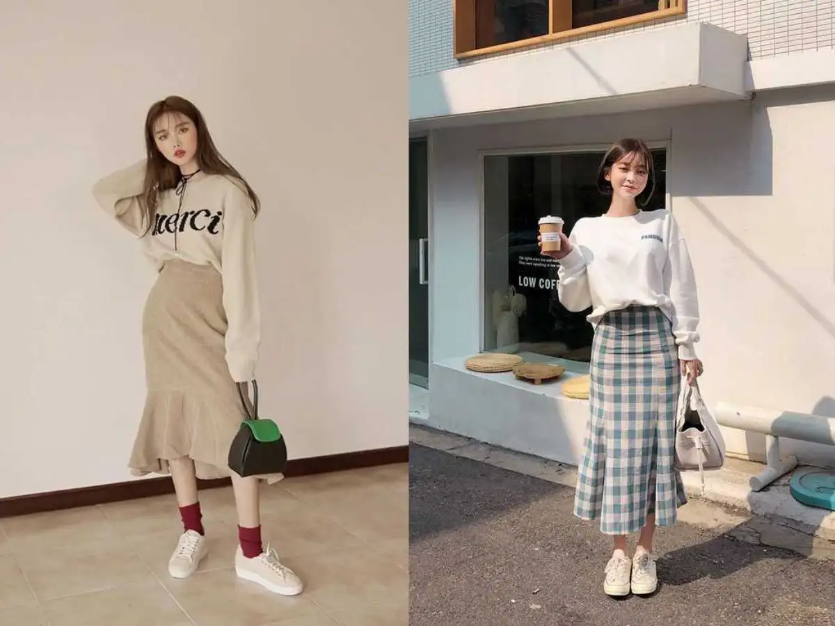 Sự kết hợp giữa chất liệu dày dặn của áo len và độ rũ, xòe của chân váy tạo cảm giác ấm cúng
