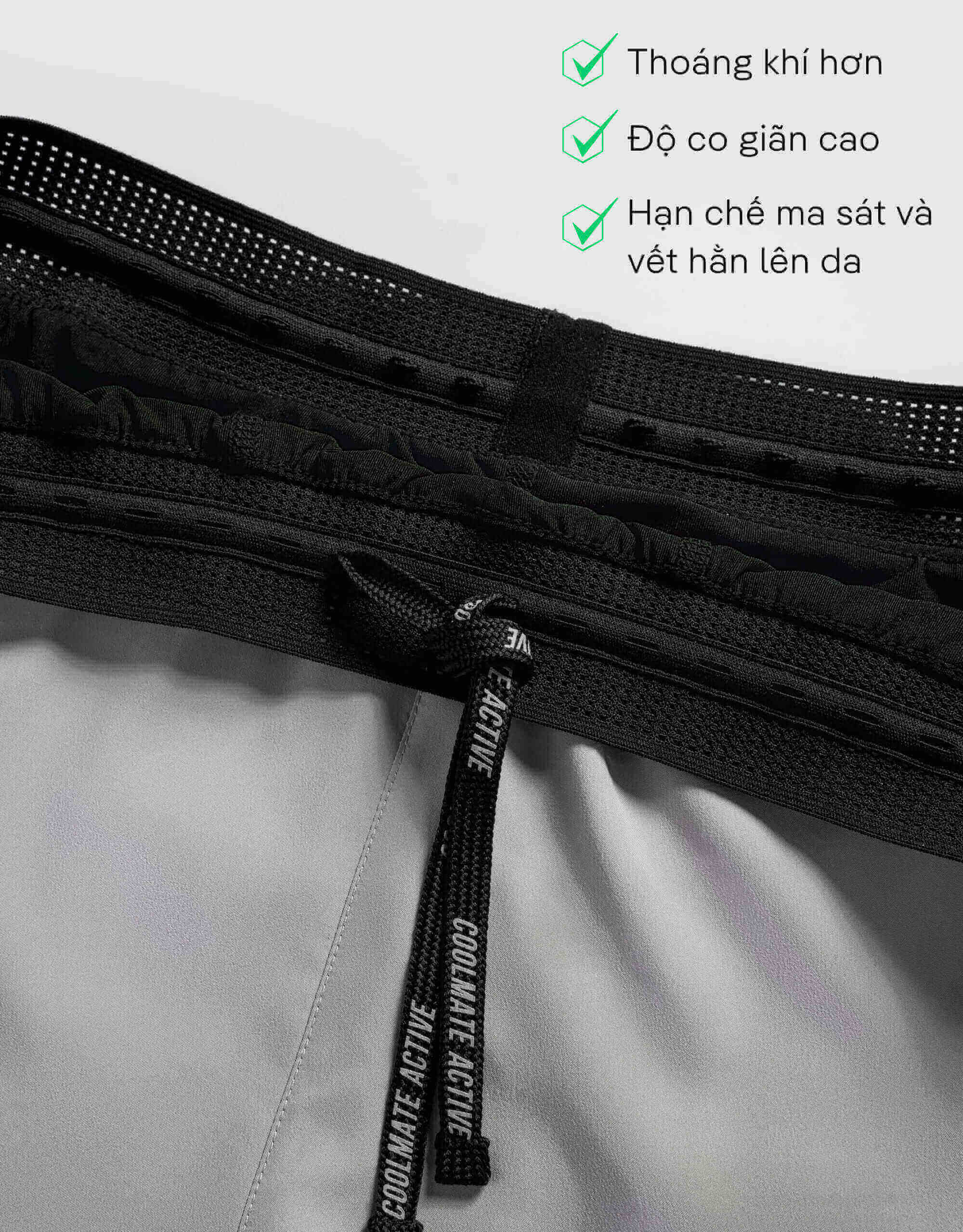 Cận cảnh dây rút dệt chữ Coolmate Active trên lưng quần short