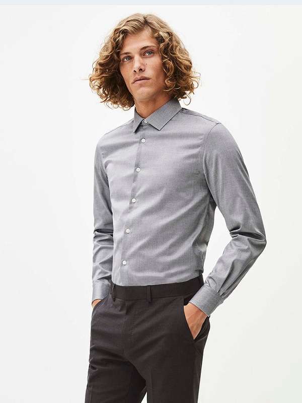 gray shirt and trousers