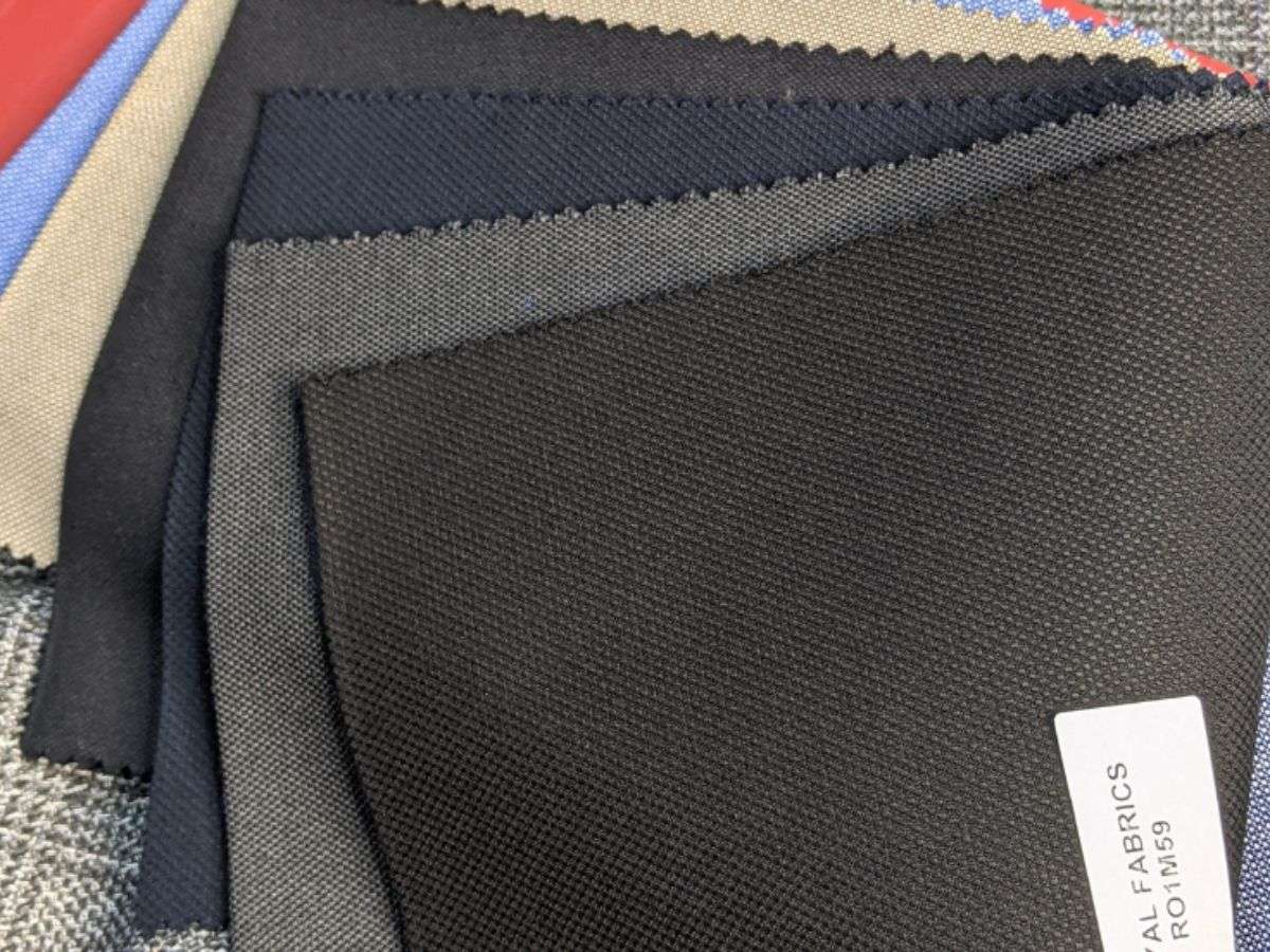 Vải Polyester may áo vest