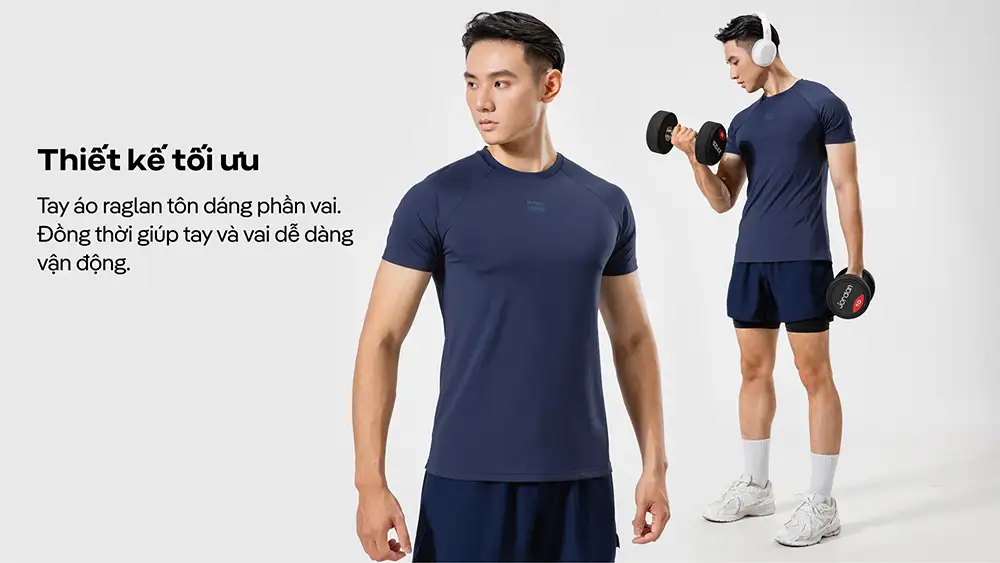 Áo Gym Powerfit màu xanh navy thiết kế tay raglan tôn vai, hỗ trợ chuyển động linh hoạt khi tập luyện