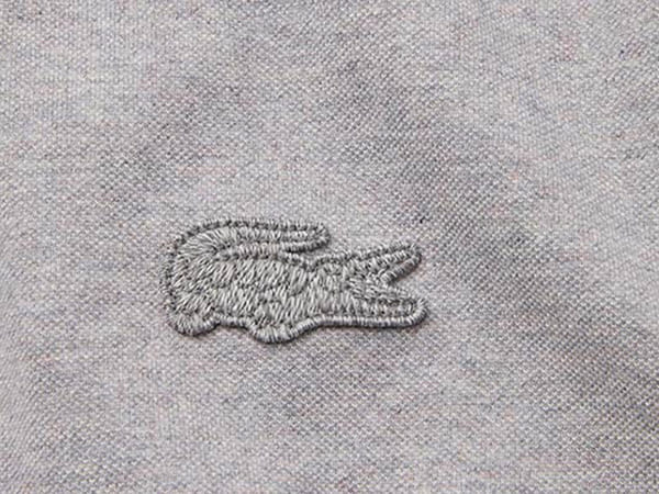 Logo cá sấu Lacoste được thêu lần đầu tiên trên áo