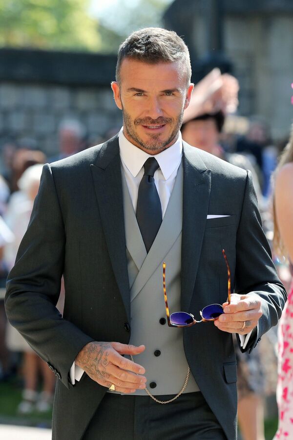 Diện đồ vest trong bộ sưu tập thời trang nam trung niên của David Beckham càng khiến chị em mê mẩn