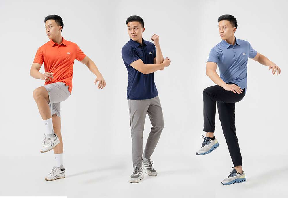 Ba người mẫu mặc áo polo Pro Active màu cam, xanh navy và xanh dương phối đồ năng động