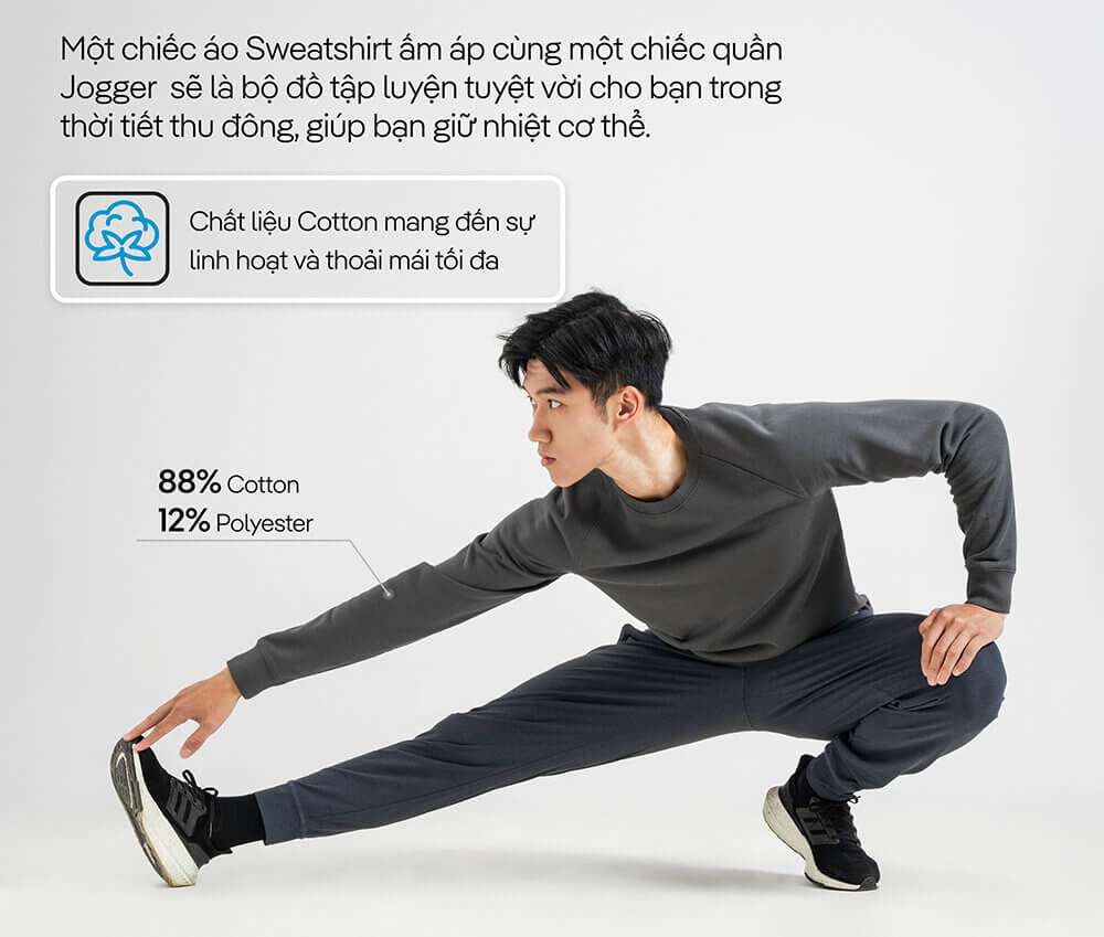 Người mẫu nam co giãn với áo Sweatshirt Active màu xám và thông tin chất liệu 88% Cotton, 12% Polyester