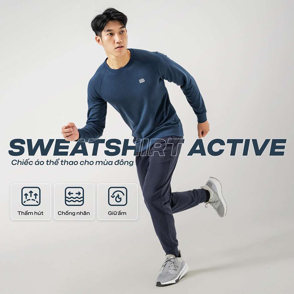 Người mẫu nam mặc áo Sweatshirt Active màu xanh navy đang chạy bộ