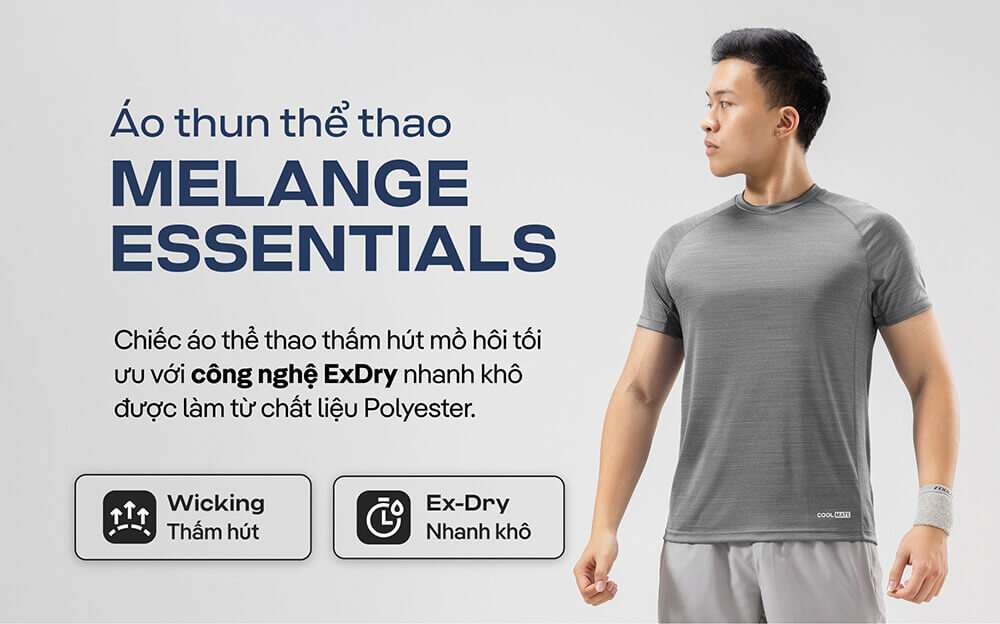Áo thun thể thao Melange Essentials màu xám mặc bởi người mẫu nam