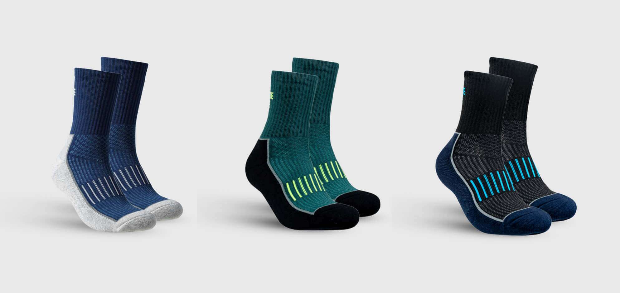 Ba phiên bản màu sắc của tất chạy bộ Active cổ dài: xanh navy, xanh rêu và đen